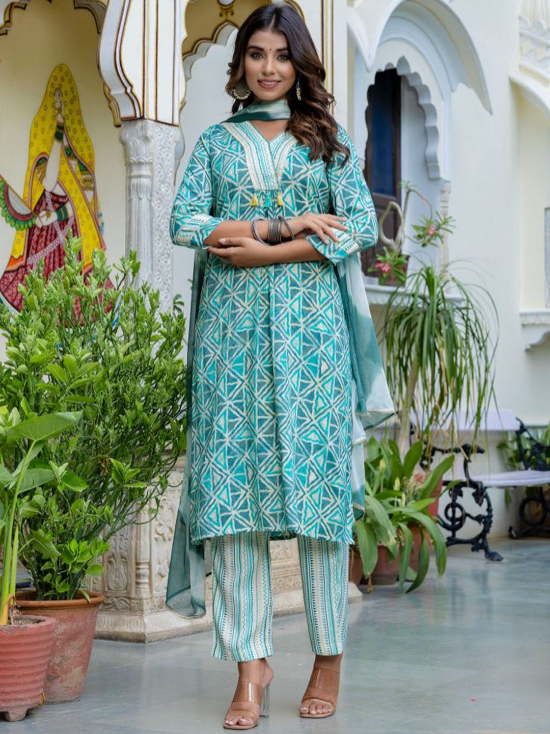 

KALINI Women Printed Regular Sequinned Kurta with Trousers & With Dupatta, Turquoise blue