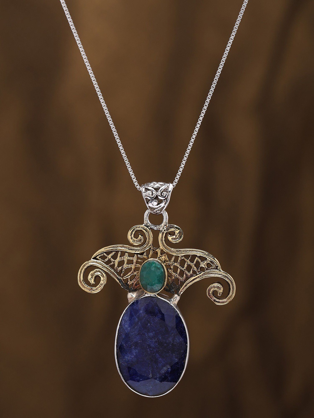 

Exotic India Victorian Style Sterling Silver Pendant with Faceted Lapis Lazuli and Emerald, Blue