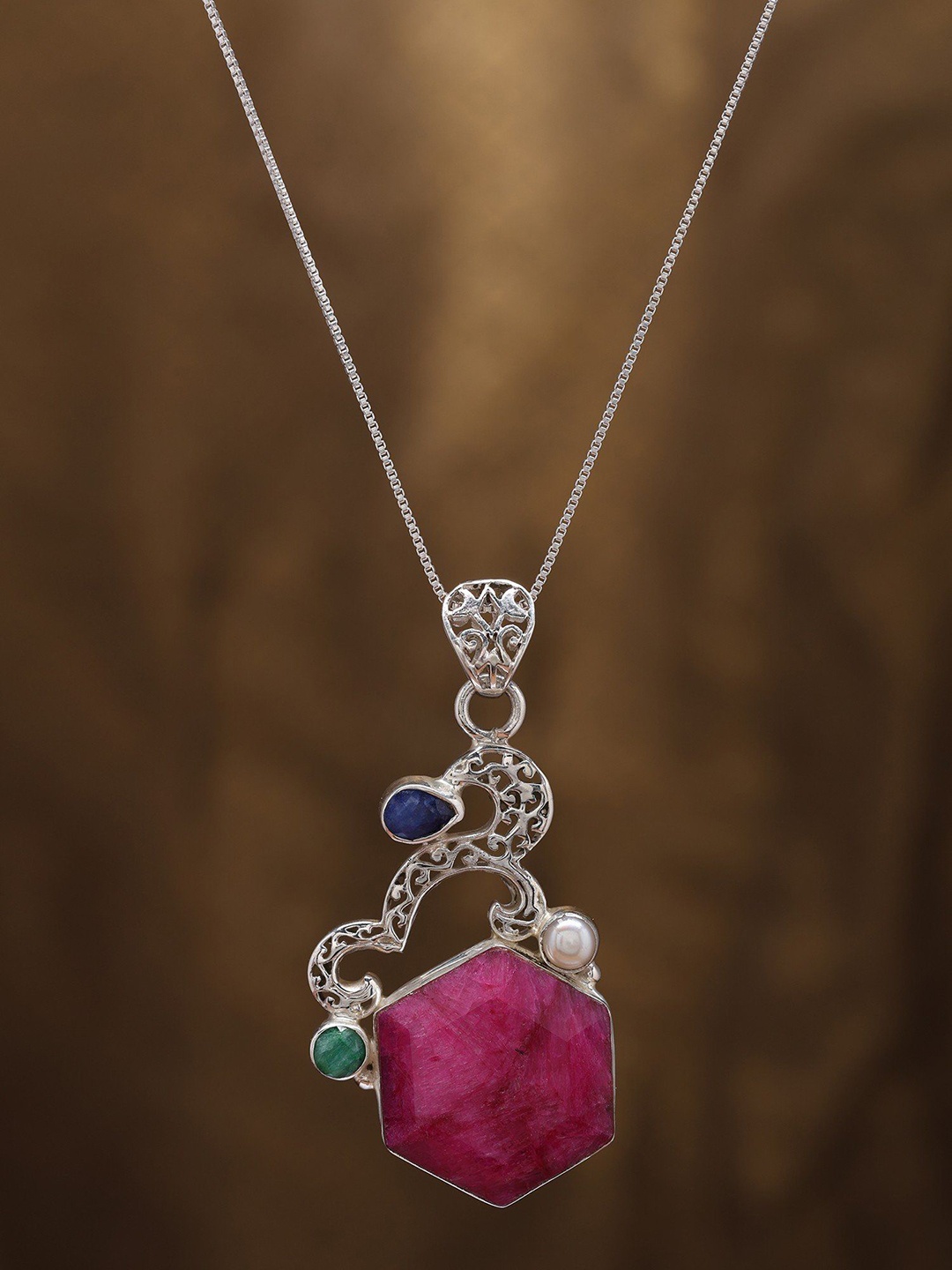 

Exotic India Hexagon Shaped Ruby Pendant with Blue Sapphire and Emerald, Pink