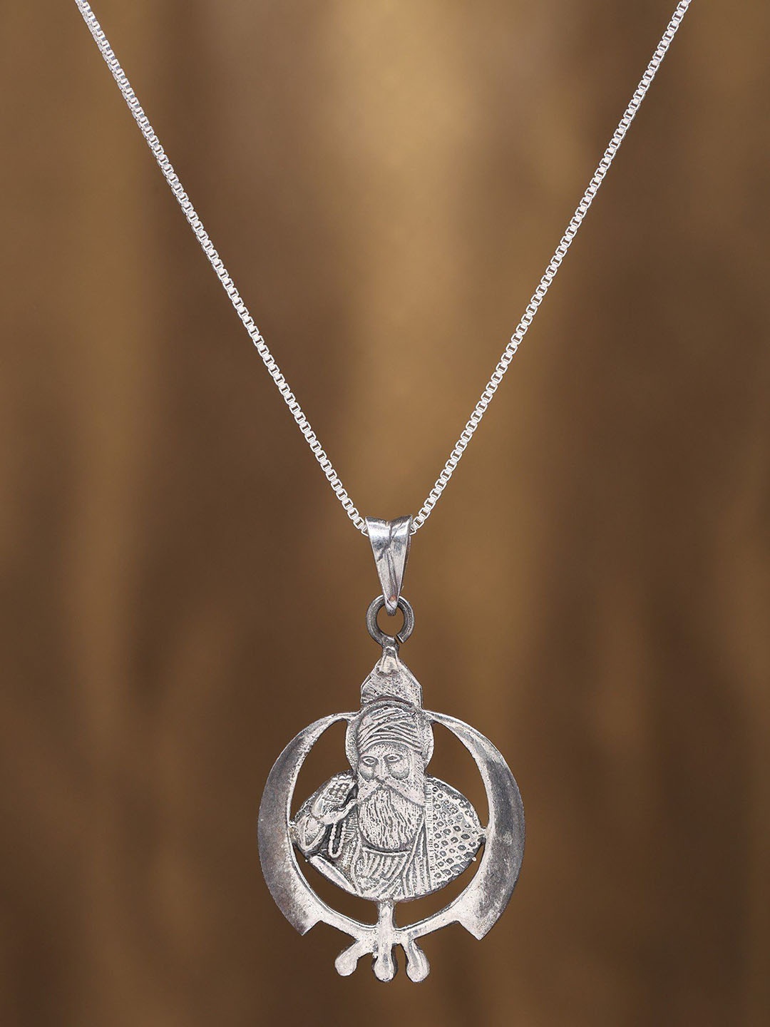 

Exotic India Guru Gobind Singh Ji with Khanda Pendant in Sterling Silver