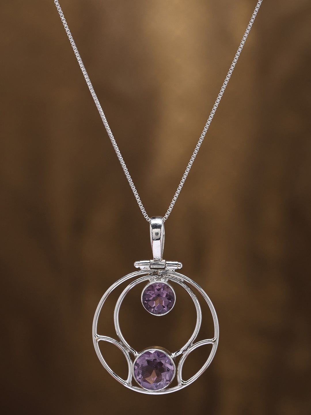 

Exotic India Round Shape Sterling Silver Pendant with Duplet Faceted Amethyst