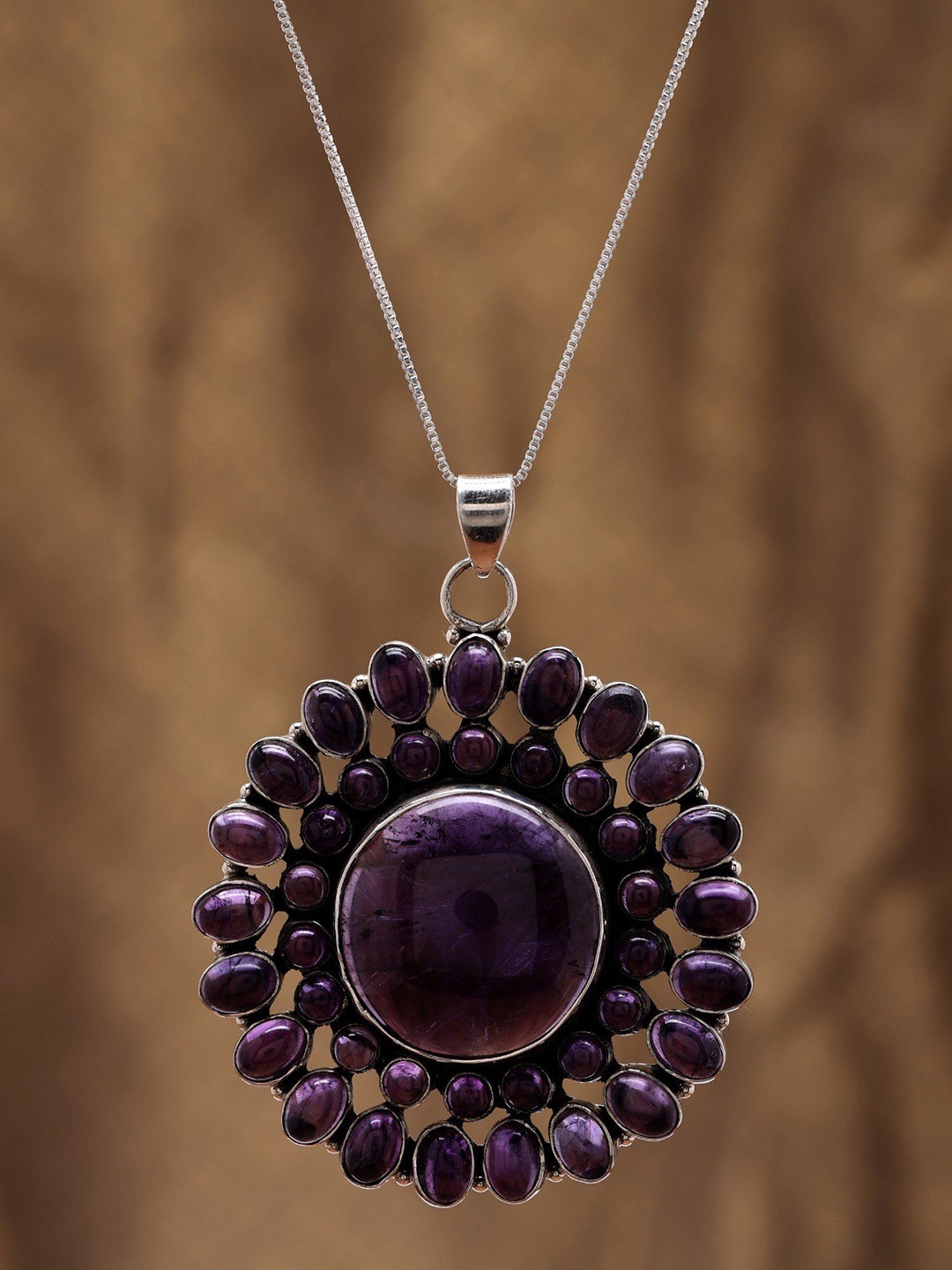 

Exotic India Floral Design Sterling Silver Pendant with Amethyst Gemstone, Purple