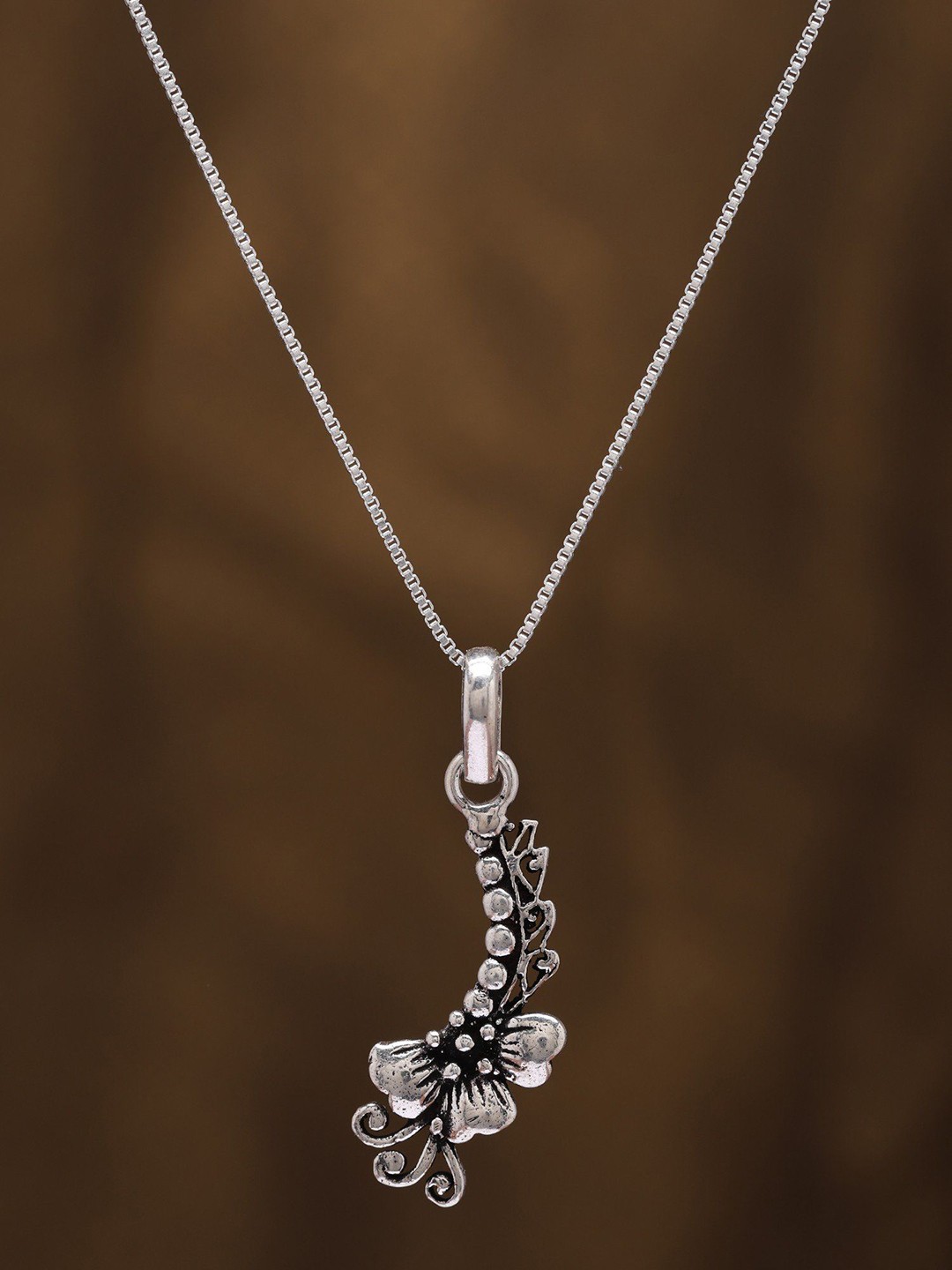 

Exotic India Designer Half Flower Sterling Silver Pendant