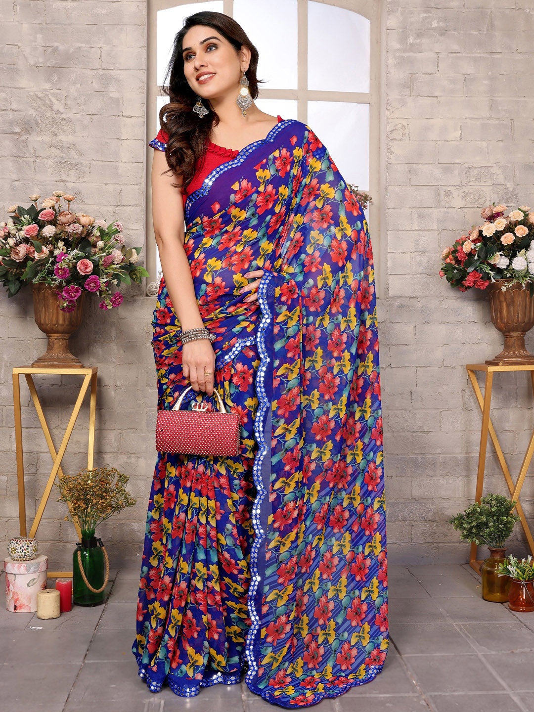 

Ambuja International Floral Printed Mirror Work Pure Georgette Saree, Blue