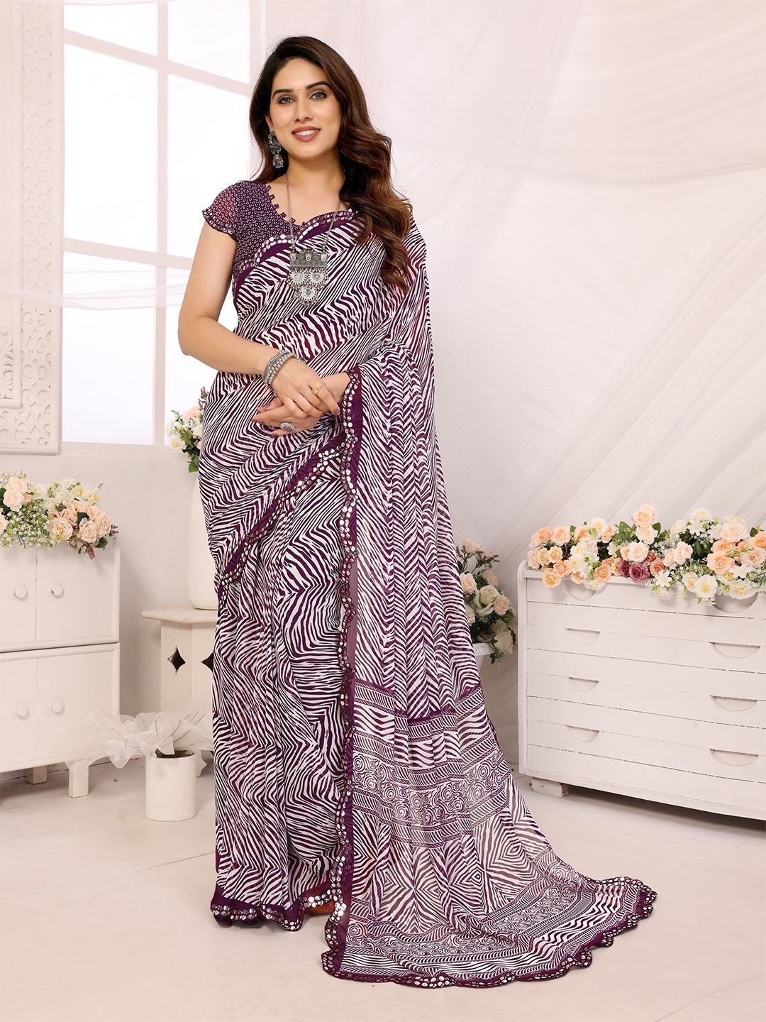 

Ambuja International Printed Pure Georgette Saree With Mirror Work, Purple