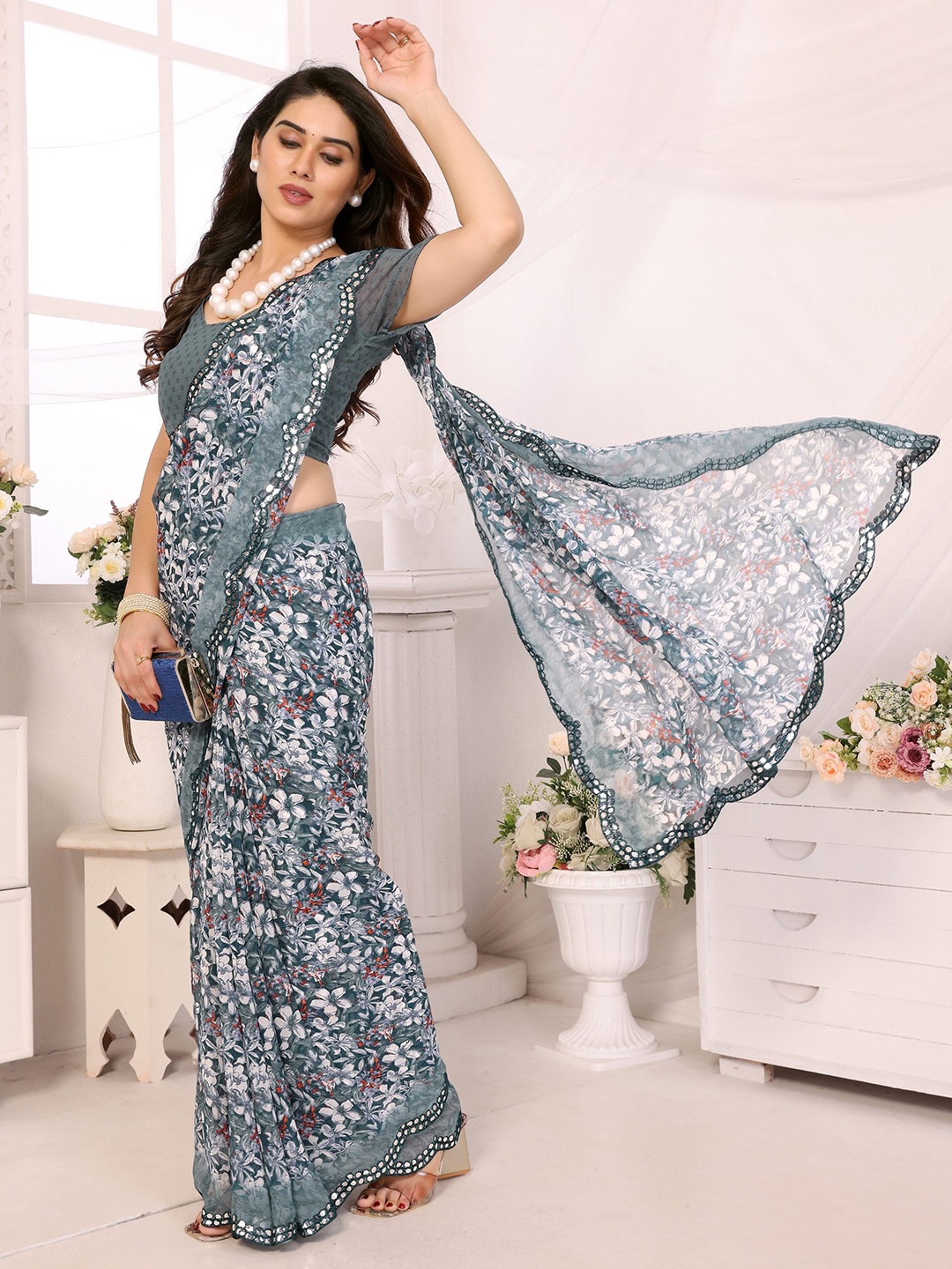 

Ambuja International Floral Mirror Work Pure Georgette Saree, Teal