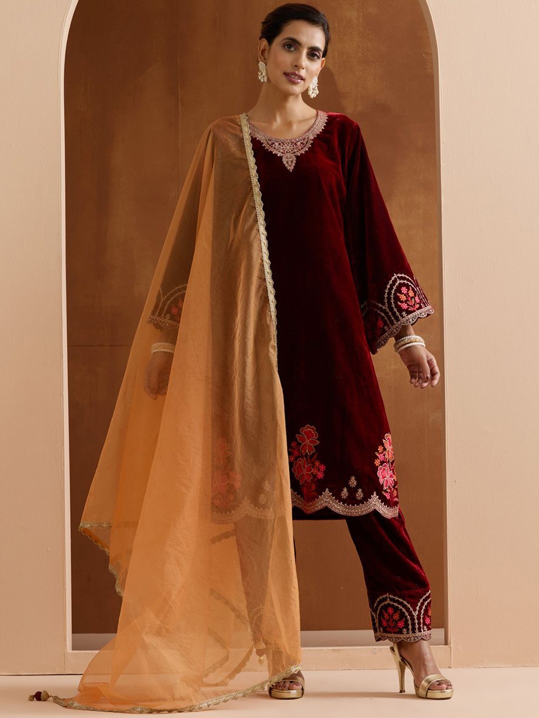 

Ishin Women Ethnic Motifs Embroidered Regular Sequinned Velvet Kurta with Trousers & With Dupatta, Maroon