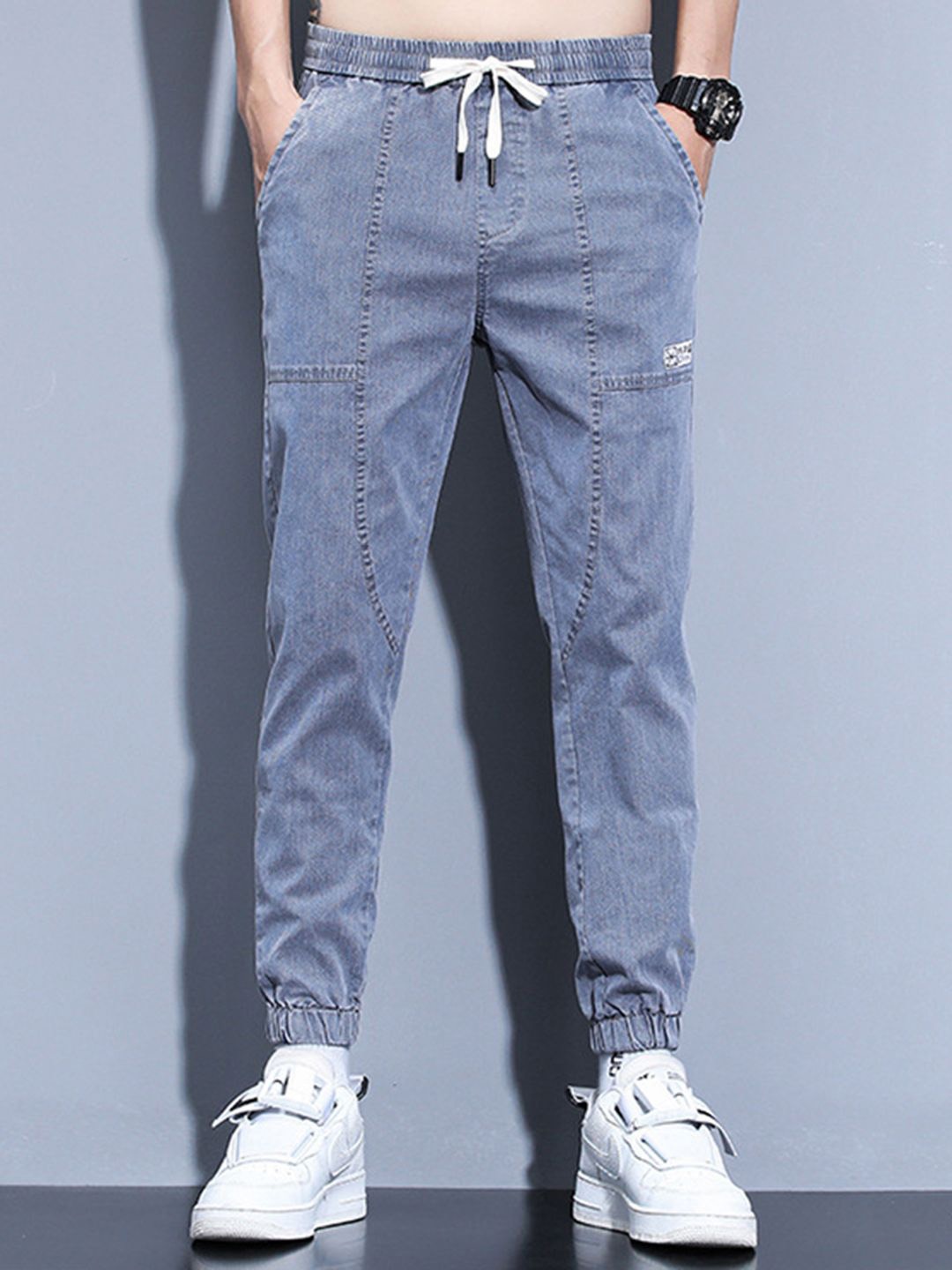 

StyleCast Men Regular Fit High Rise Elasticated Jogger Jeans, Blue