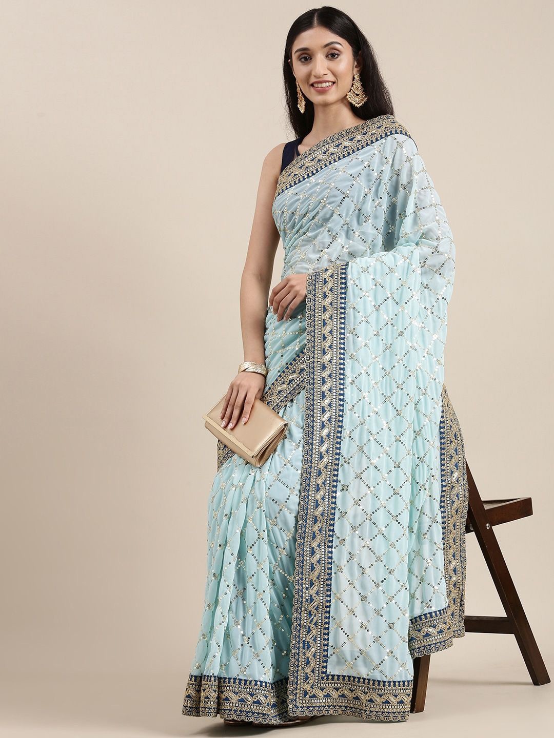 

NIRMAL CREATION Embellished Sequinned Pure Georgette Saree, Turquoise blue