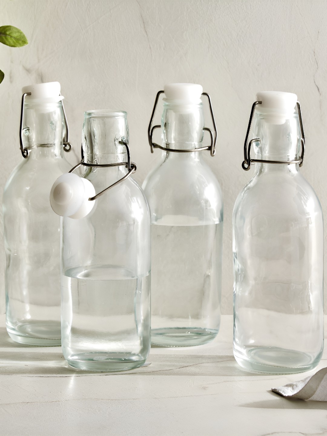 

Home Centre Transparent Set of 4 Glass Solid Water Bottle