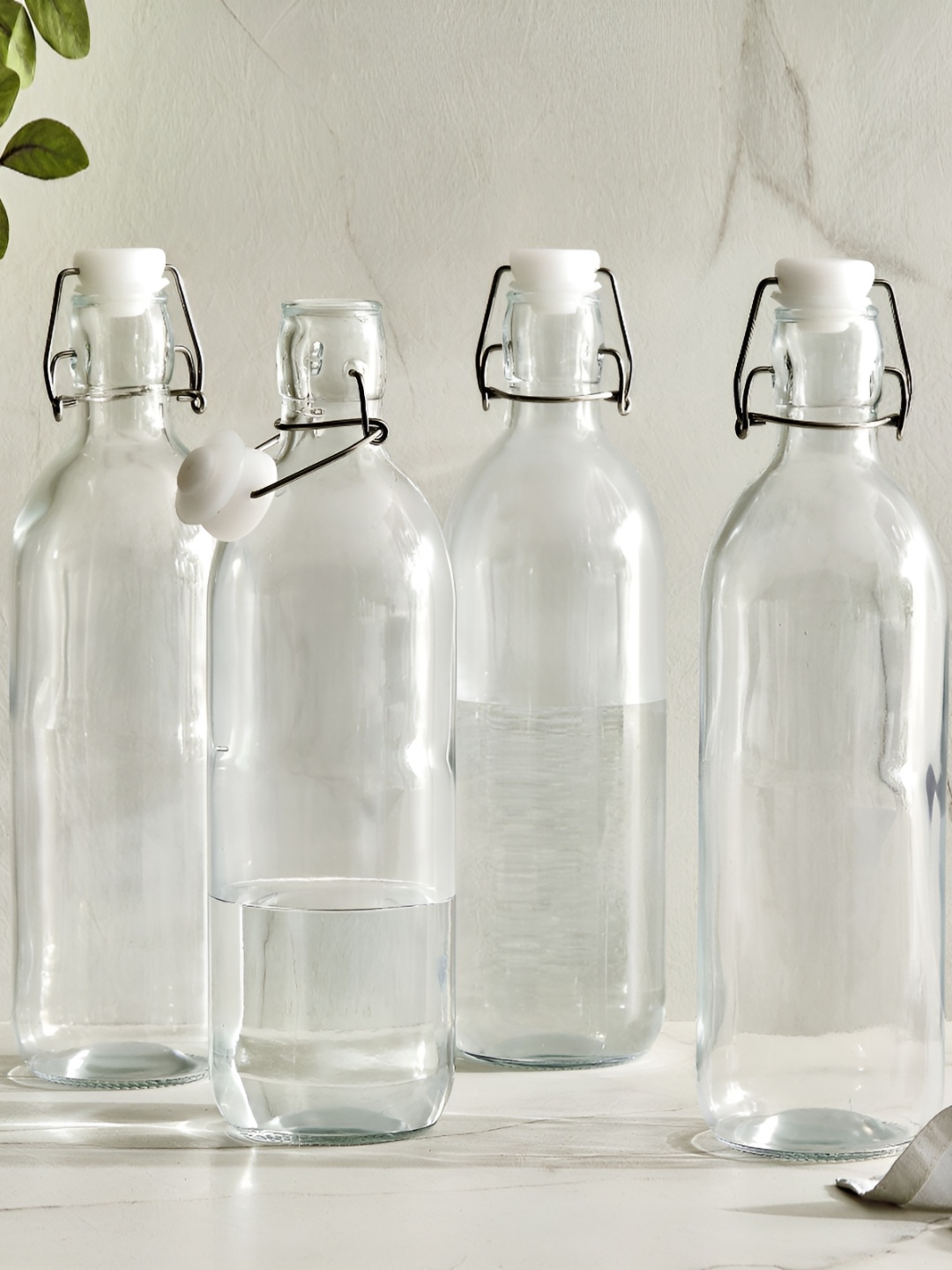 

Home Centre Transparent Set of 4 Glass Solid Water Bottle