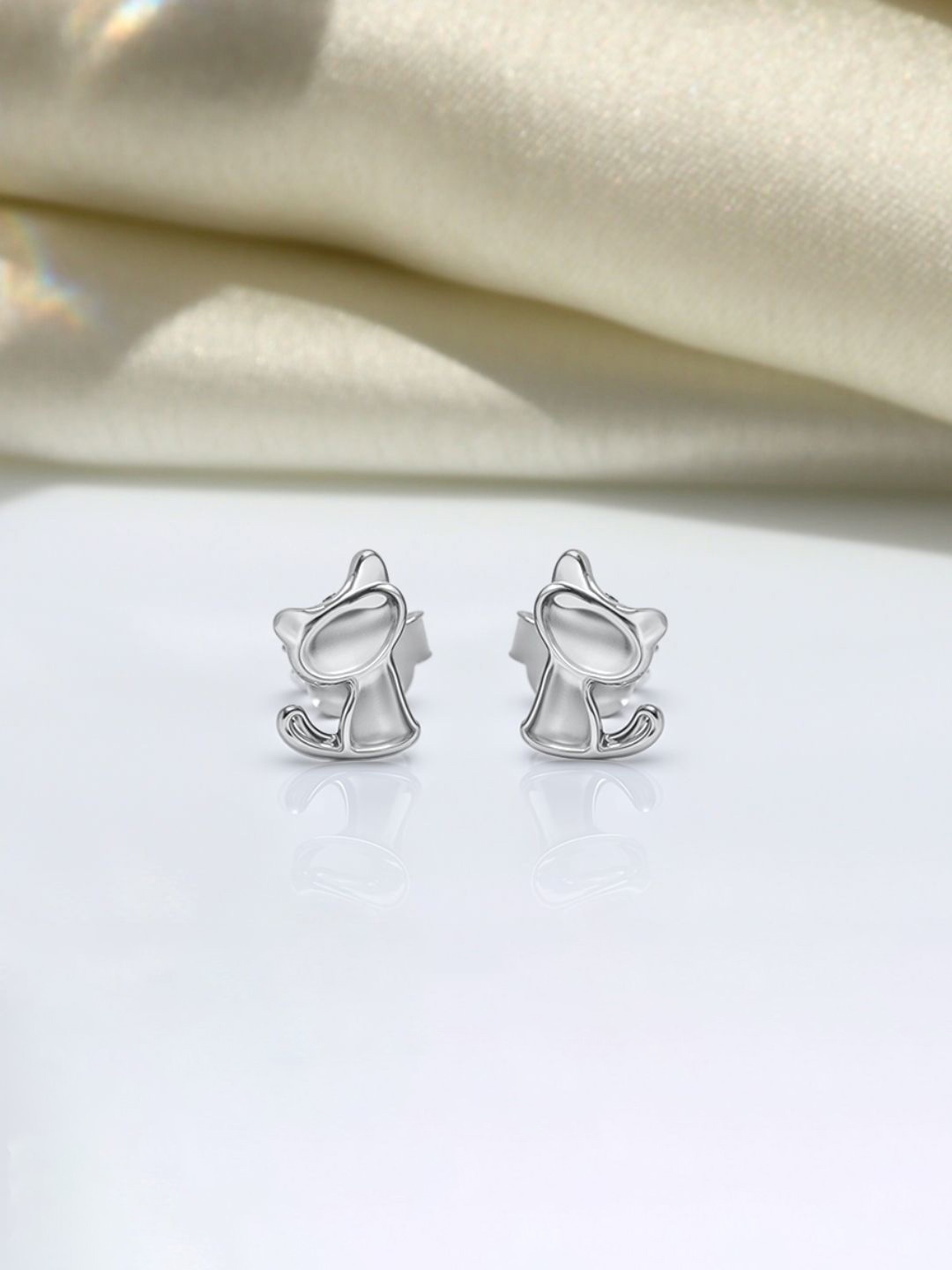 

HighSpark Contemporary Studs Earrings, Silver