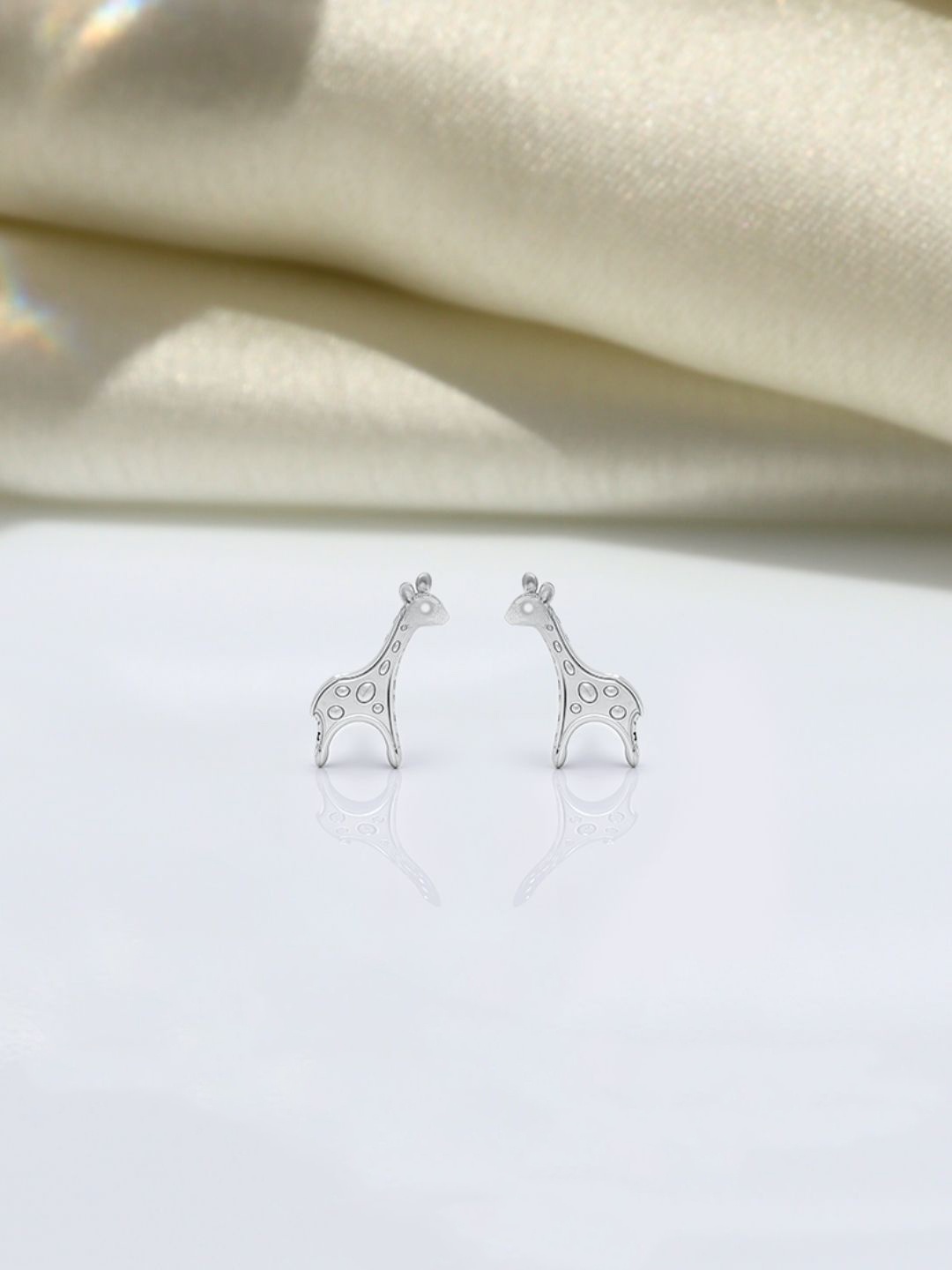 

HighSpark Contemporary Studs Earrings, Silver