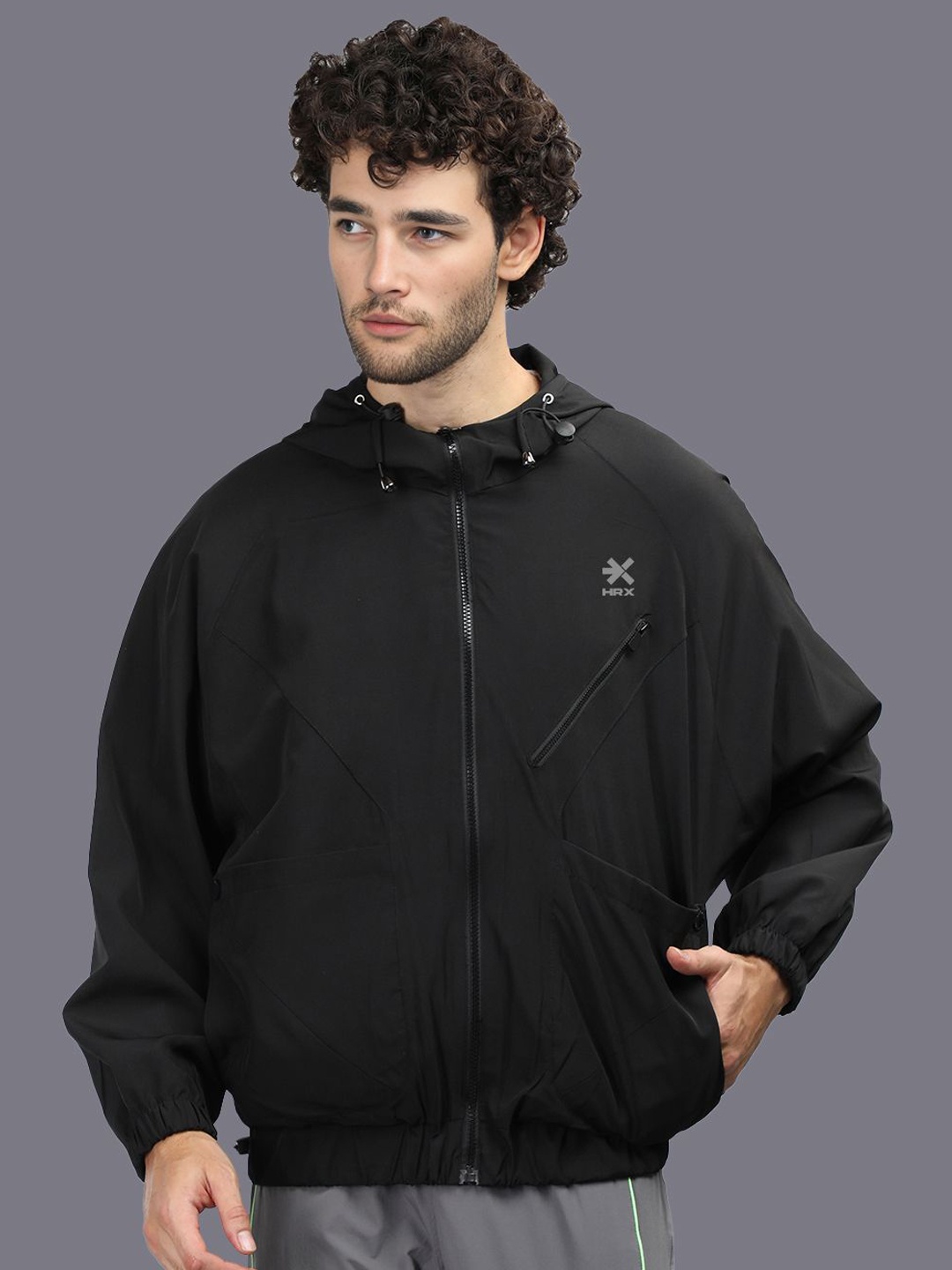 

HRX by Hrithik Roshan Men Hooded Solid Casual Windcheater Sporty Jacket, Black