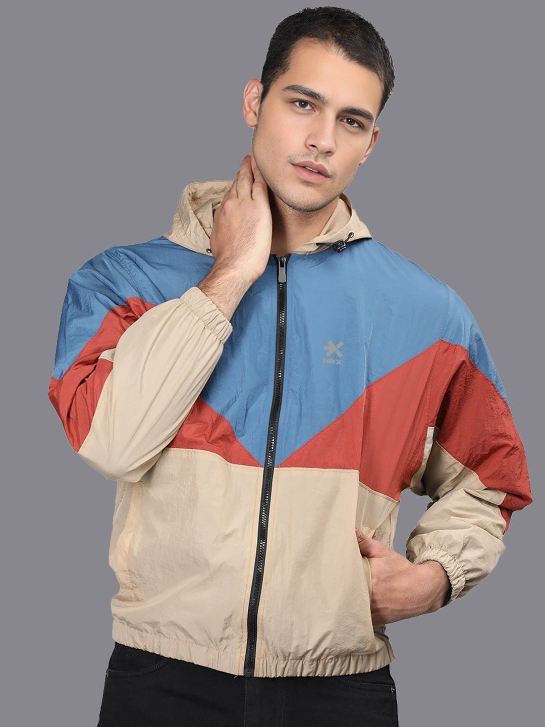 

HRX by Hrithik Roshan Men Hooded Colourblocked Casual Windcheater Sporty Jacket, Blue