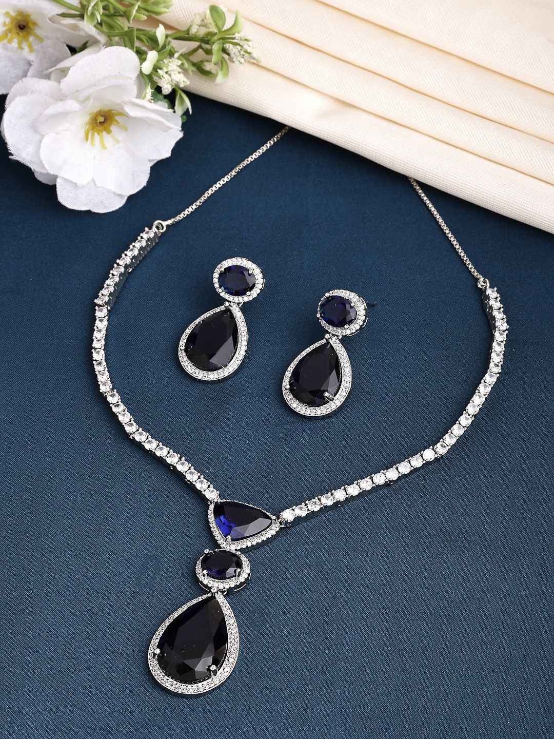 

ZENEME Rhodium-Plated Tear Drop Crystal Blooms Blue Stone Pendant & Earring Set, Silver