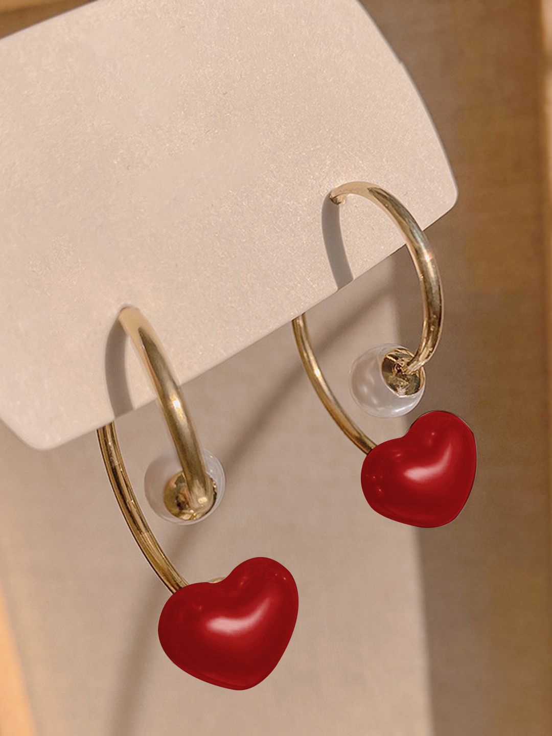 

Krelin Rhodium-Plated Pearl Studded Heart Shaped Half Hoop Earrings, Red