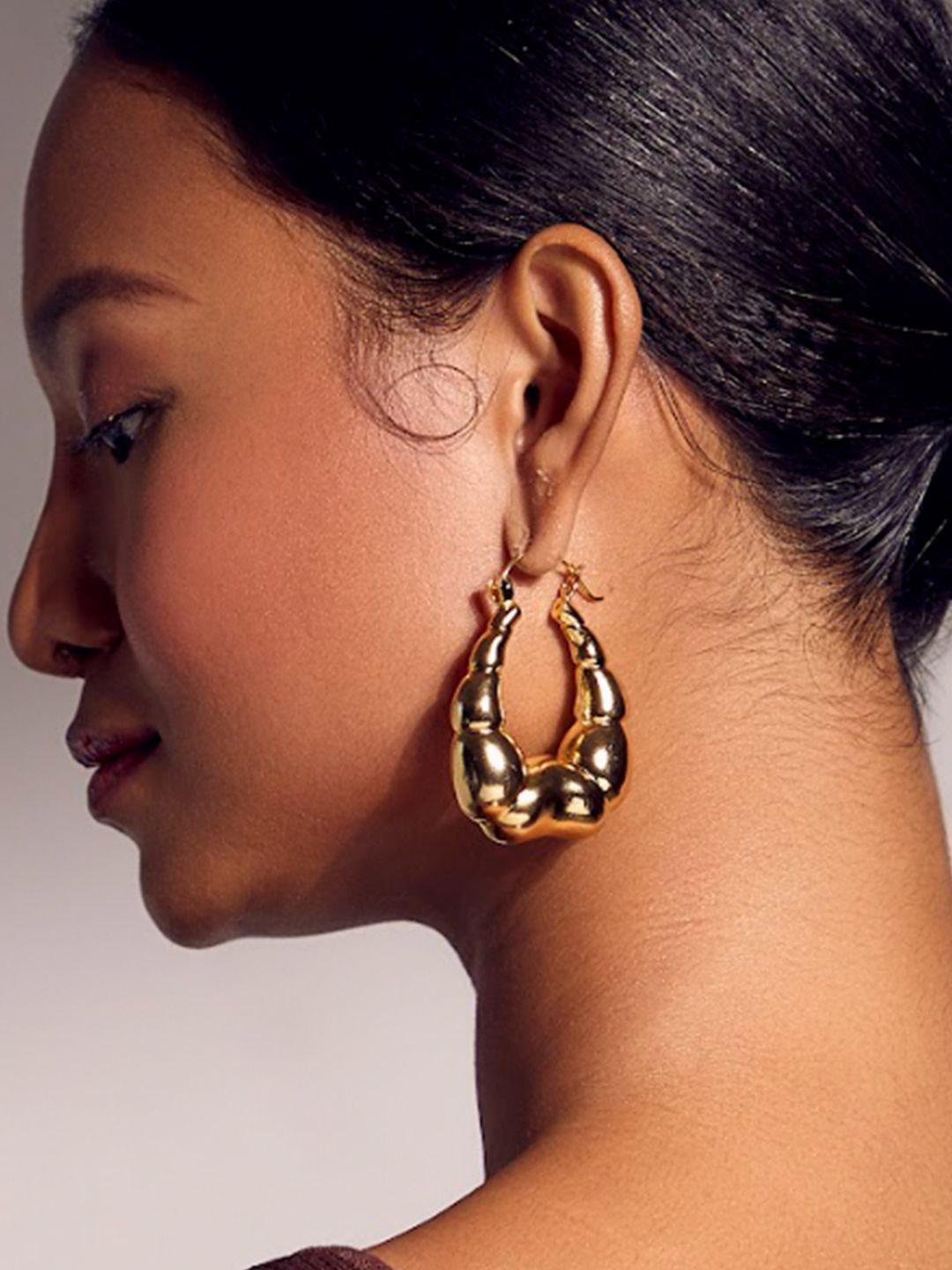 

Ethnic Andaz Gold-Plated Contemporary Hoop Earrings