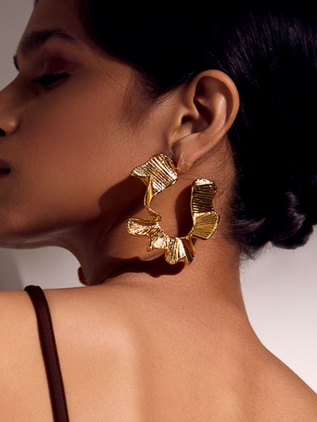 

Ethnic Andaz Gold-Plated Classic Shaped Half Hoop Earrings