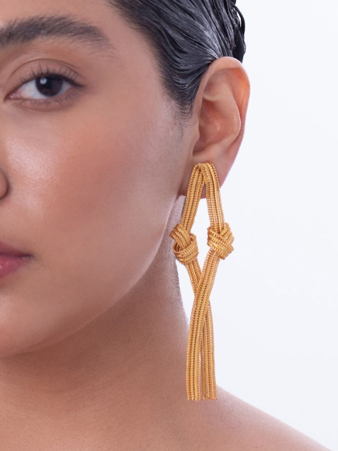 

Ethnic Andaz Gold-Plated Artificial Stones Studded Contemporary Shaped Drop Earrings