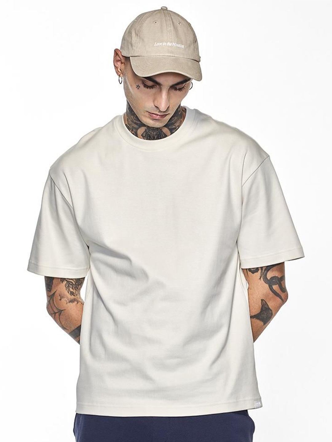 

Snitch Men Solid Round Neck Cotton Relaxed Fit T-shirt, Cream