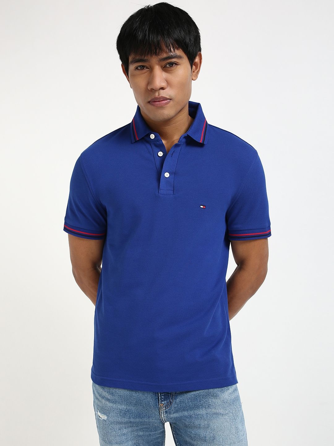 

Tommy Hilfiger Men Solid Polo Collar Slim Fit Cotton T-shirt, Blue