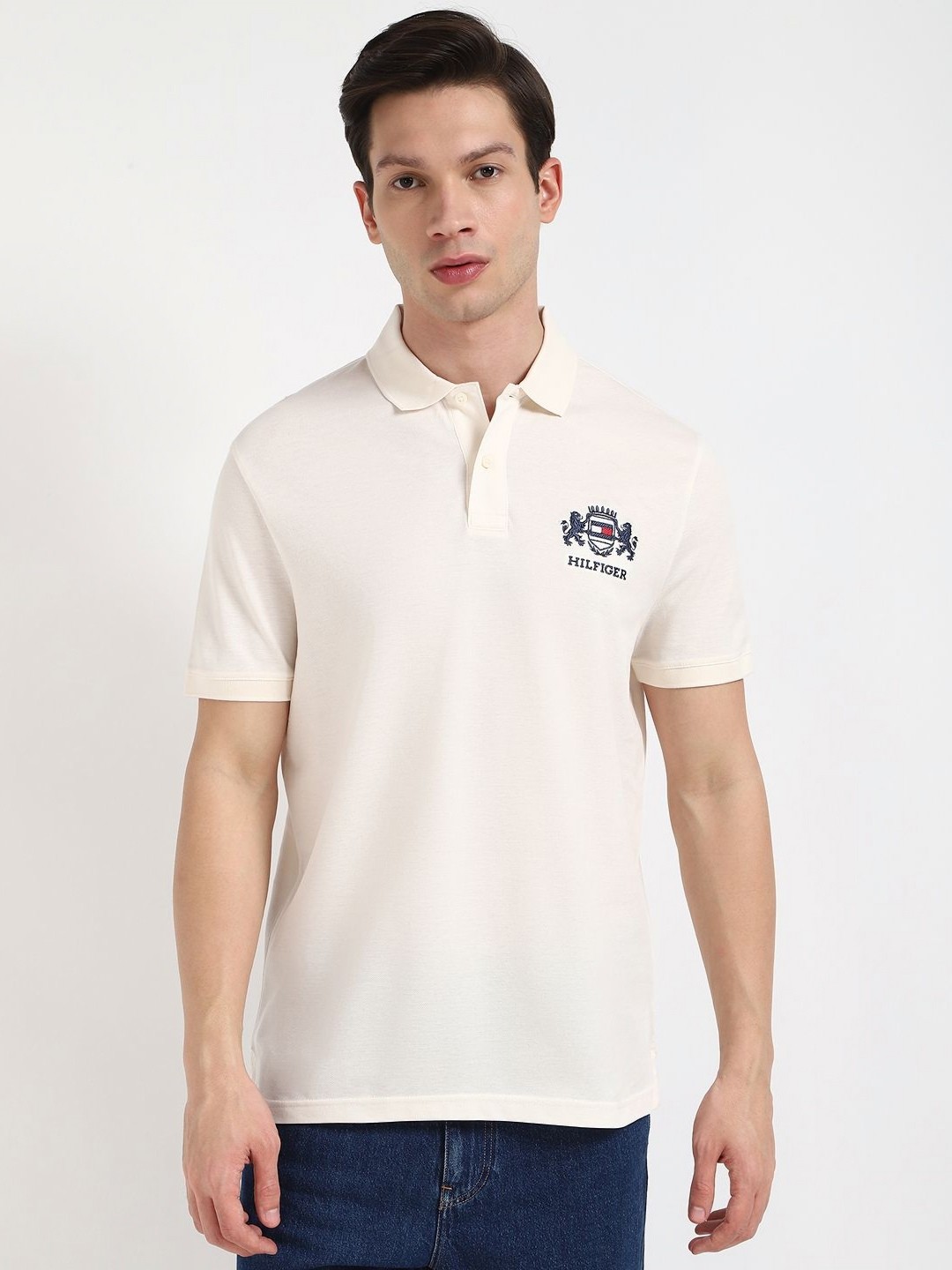 

Tommy Hilfiger Men Solid Polo Collar Cotton T-shirt, Off white