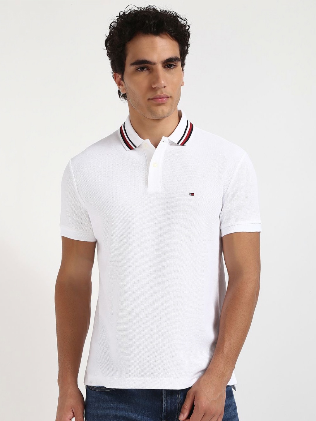 

Tommy Hilfiger Men Solid Polo Collar Cotton T-shirt, White