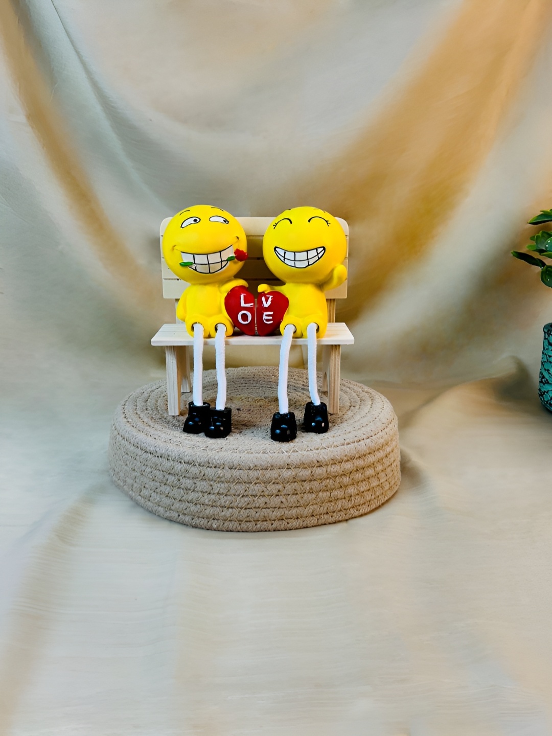 

Giftii Yellow & Red Smiley Couple Sitting On Love Bench Figurine Showpieces