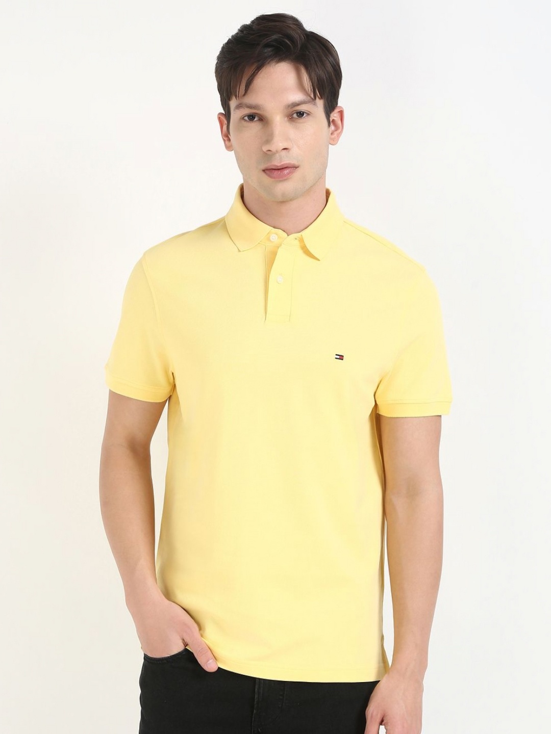 

Tommy Hilfiger Men Solid Polo Collar Cotton T-shirt, Yellow