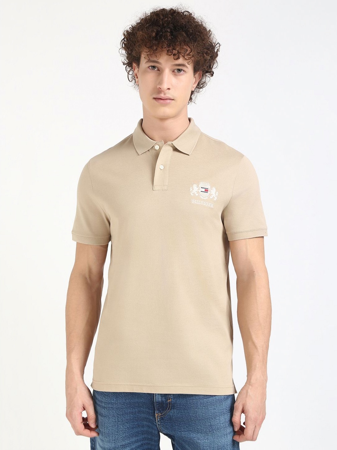 

Tommy Hilfiger Men Graphic Printed Polo Collar Cotton T-shirt, Beige