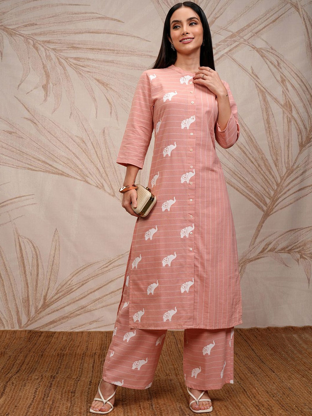 

Vishudh Mandarin Collar With Stripes With conversational Print, Kurta And Palazzo, Peach