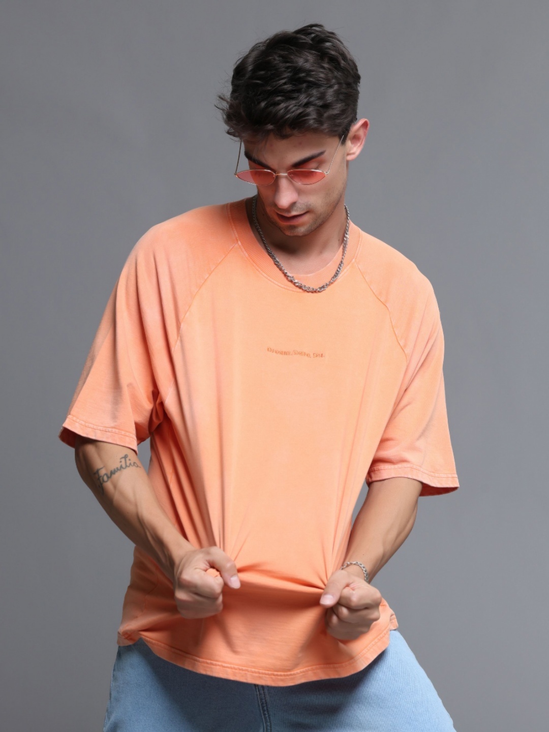 

VUDU Men Typography Printed Round Neck Cotton Oversized T-shirt, Orange