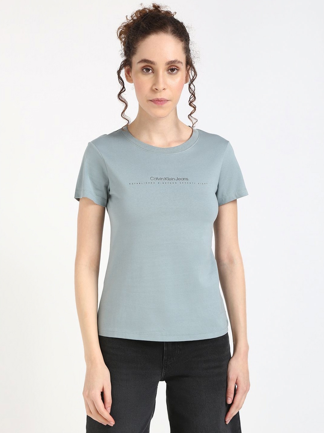 

Calvin Klein Jeans Women Typography Printed Round Neck Cotton T-shirt, Green