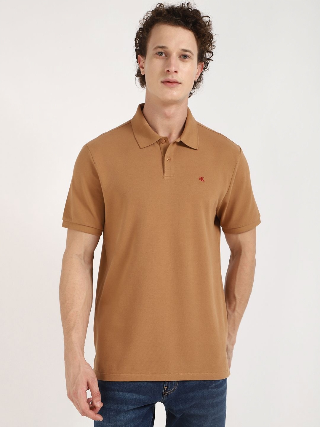 

Calvin Klein Jeans Men Solid Polo Collar Cotton T-shirt, Brown