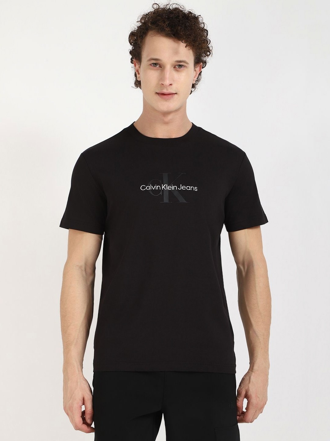 

Calvin Klein Jeans Men Typography Printed Round Neck Cotton T-shirt, Black