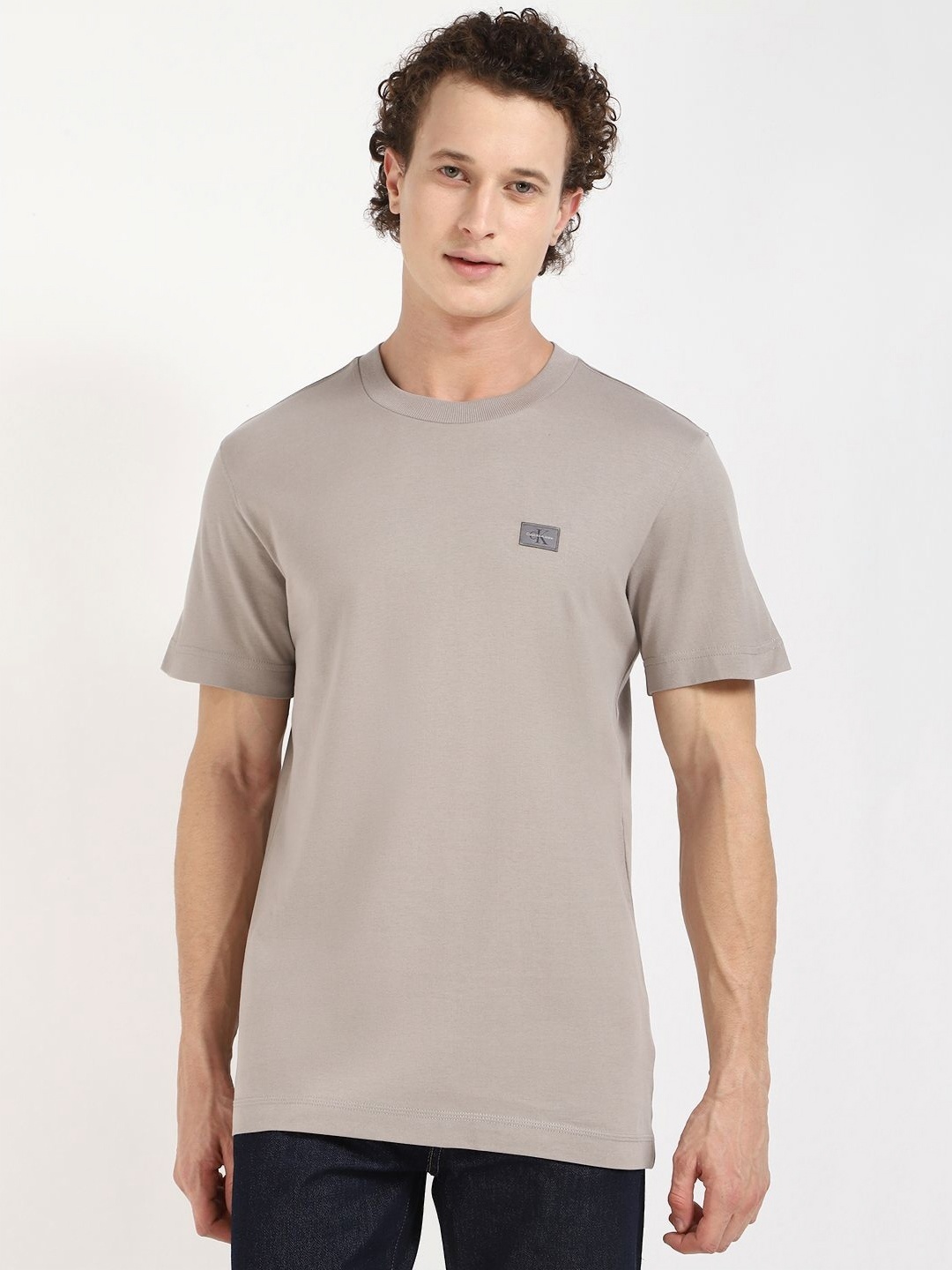 

Calvin Klein Jeans Men Solid Round Neck Cotton T-shirt, Grey