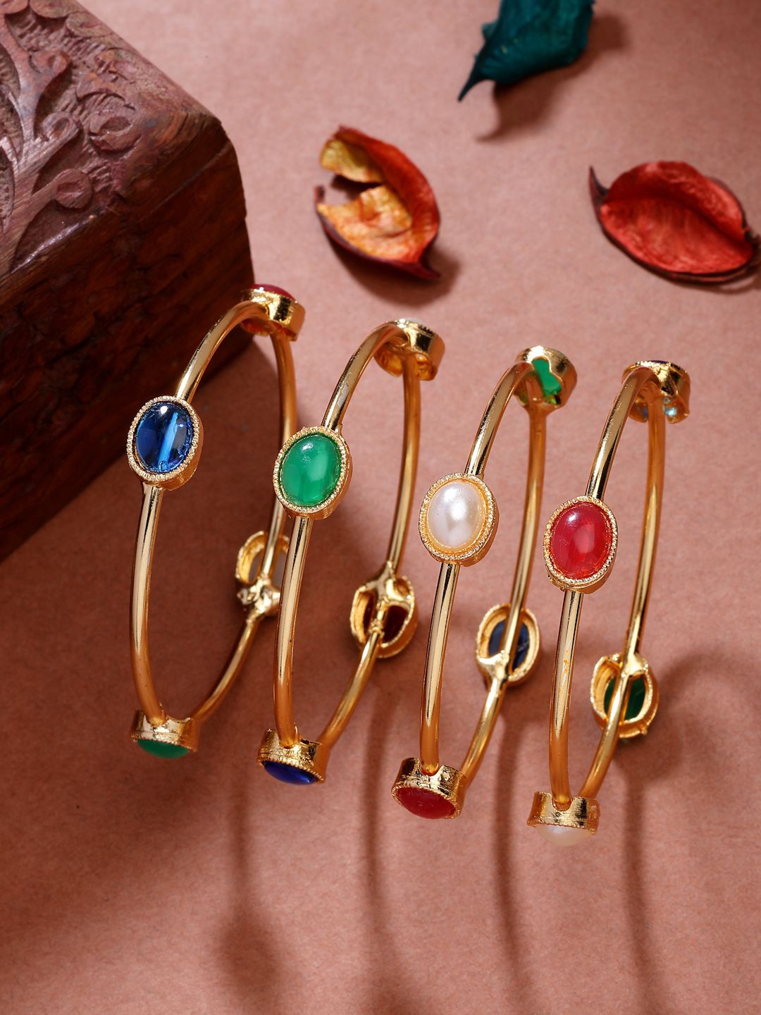 

NVR Women Set of 4 Gold-Plated Artificial Stone Studded Bangles