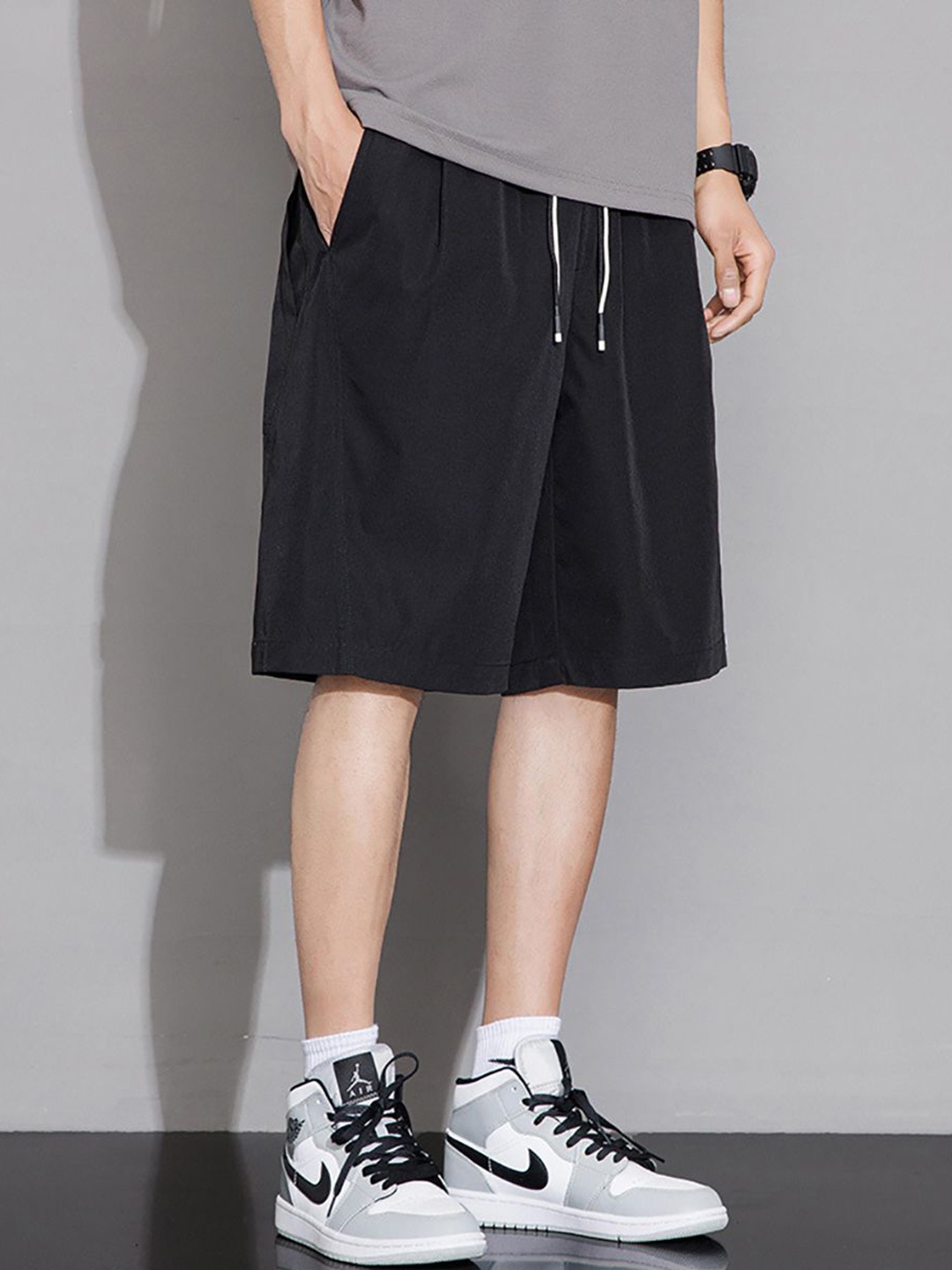

StyleCast x Revolte Men Mid-Rise Regular Fit Shorts, Black