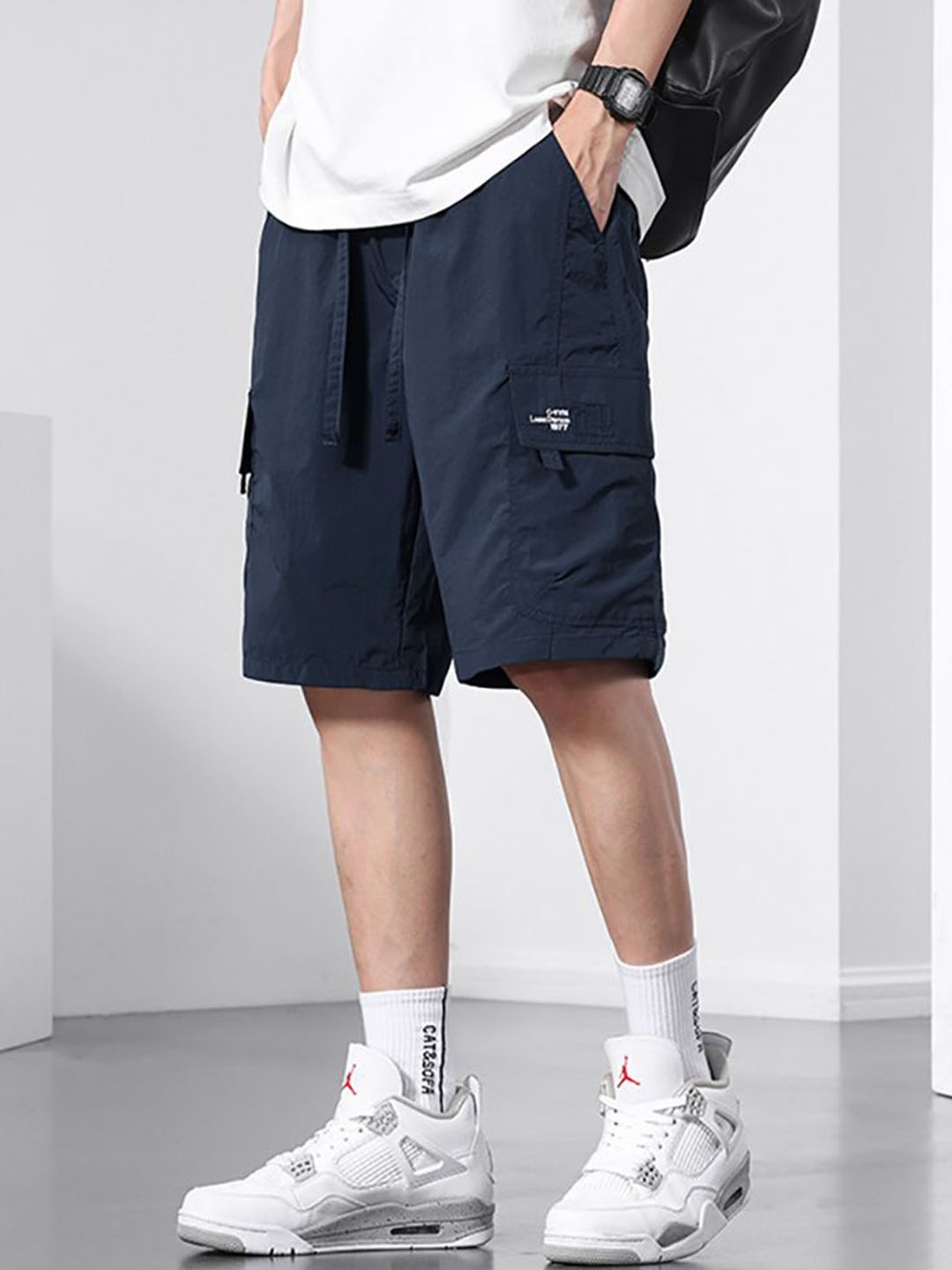 

StyleCast x Revolte Men Mid-Rise Regular Fit Shorts, Navy blue