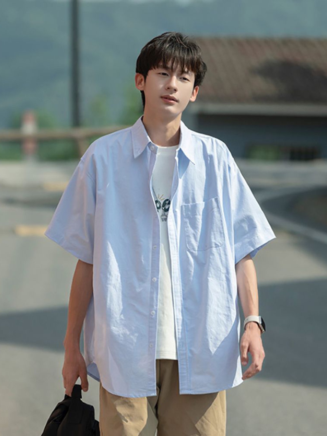 

StyleCast x Revolte Men Spread Collar Solid Casual Shirt, Blue