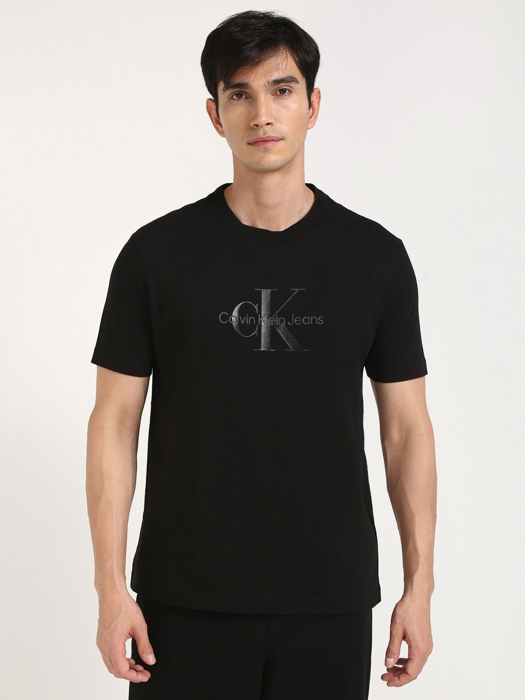 

Calvin Klein Jeans Men Typography Printed Round Neck Cotton T-shirt, Black