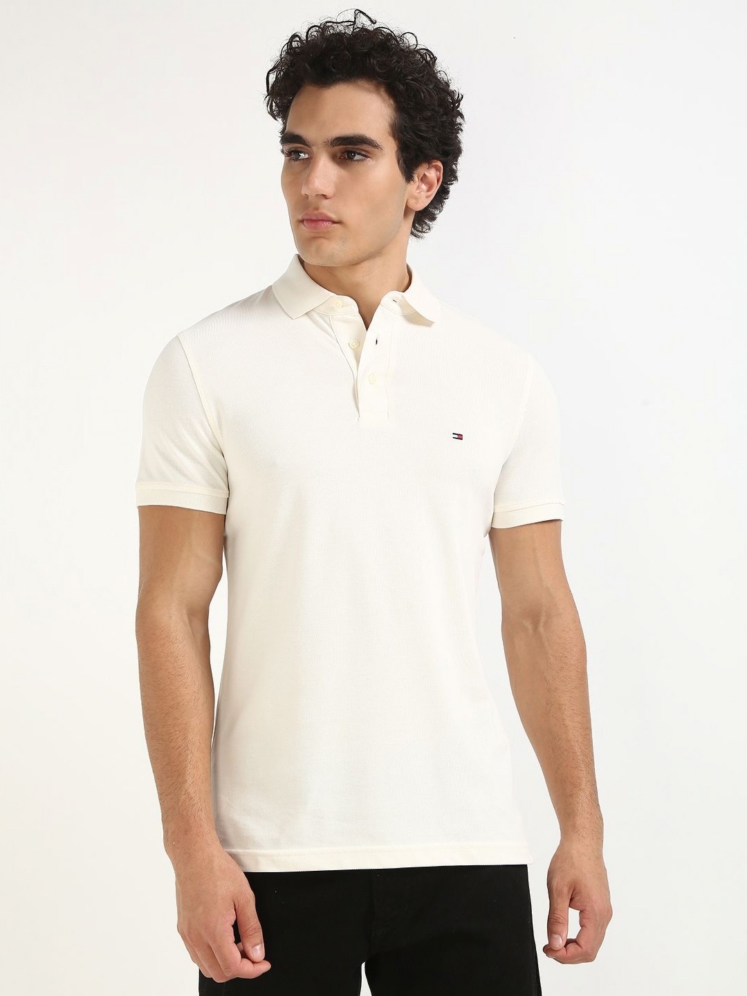 

Tommy Hilfiger Men Solid Polo Collar Cotton T-shirt, Off white
