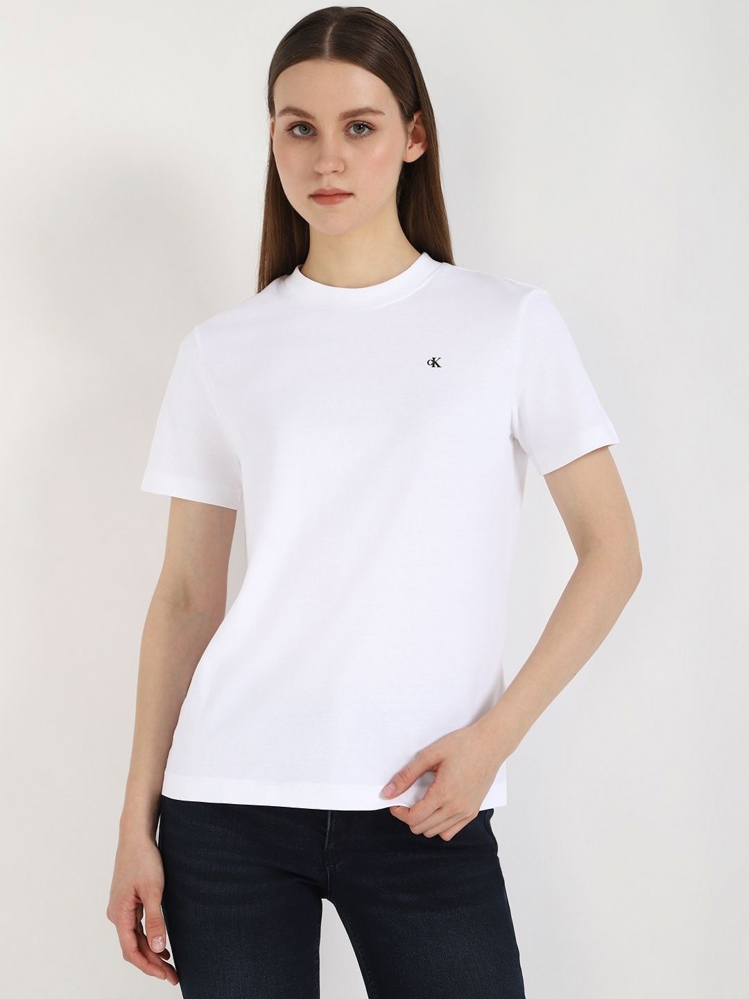 

Calvin Klein Jeans Women Solid Round Neck Cotton T-shirt, White