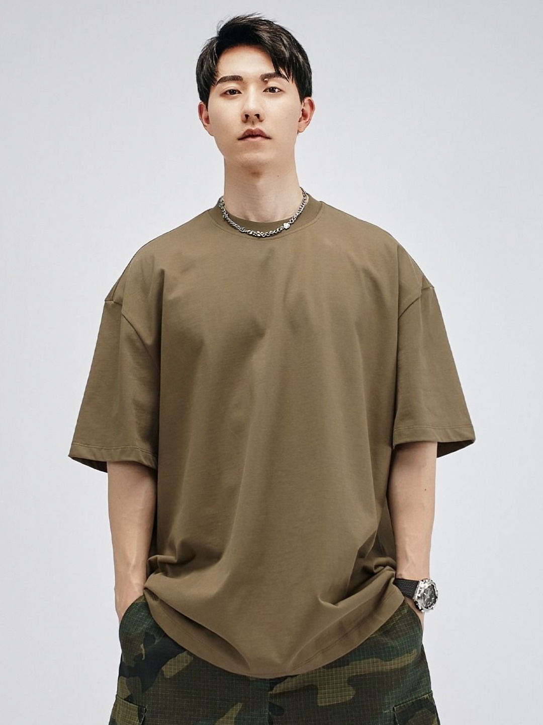 

StyleCast x Revolte Men Solid Round Neck Cotton Oversized T-shirt, Brown