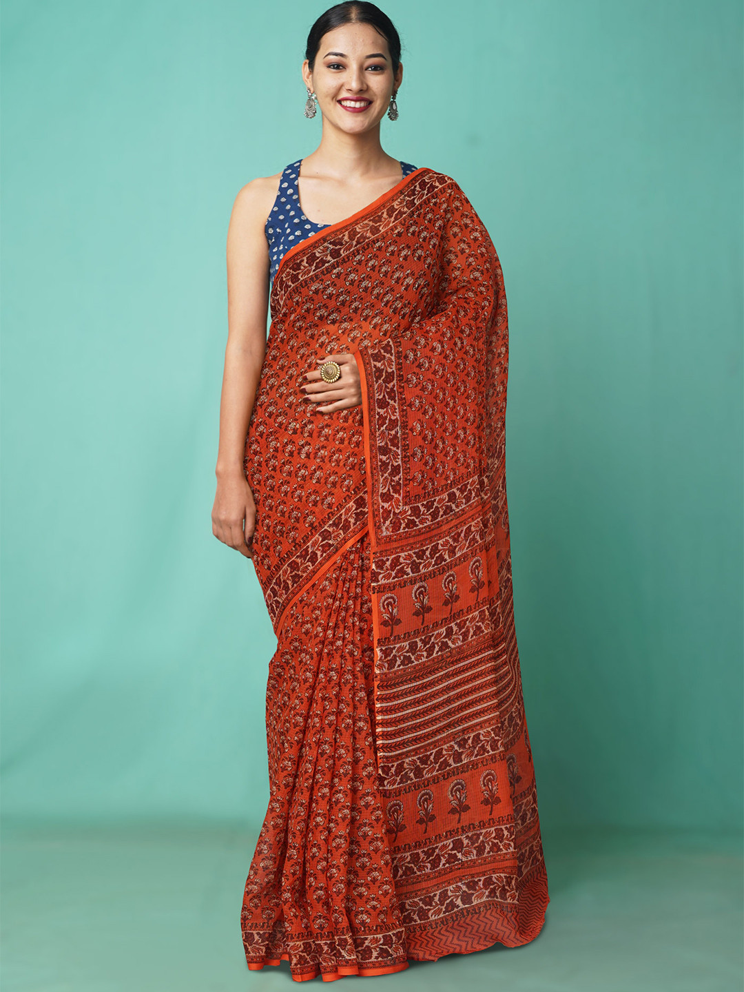 

Unnati Silks Floral Net Handloom Kota Saree, Orange