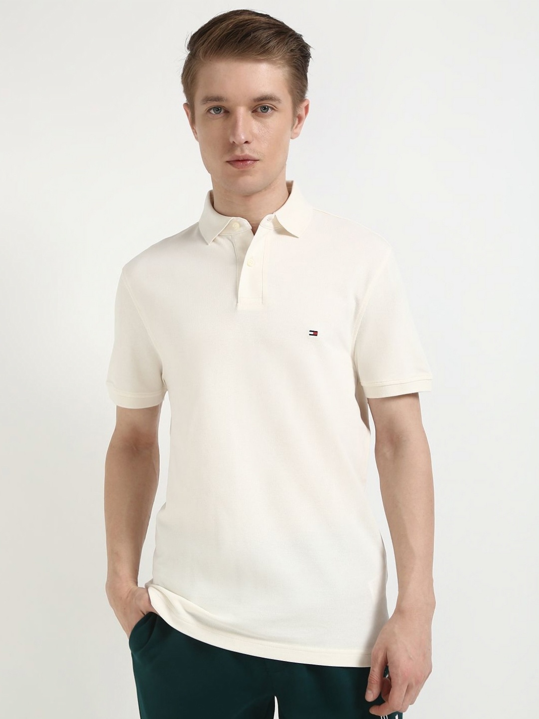 

Tommy Hilfiger Men Solid Polo Collar Cotton T-shirt, Off white