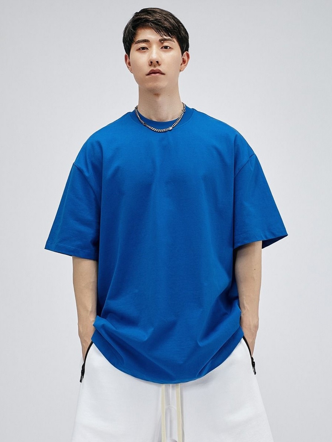 

StyleCast x Revolte Men Solid Round Neck Cotton Oversized T-shirt, Blue