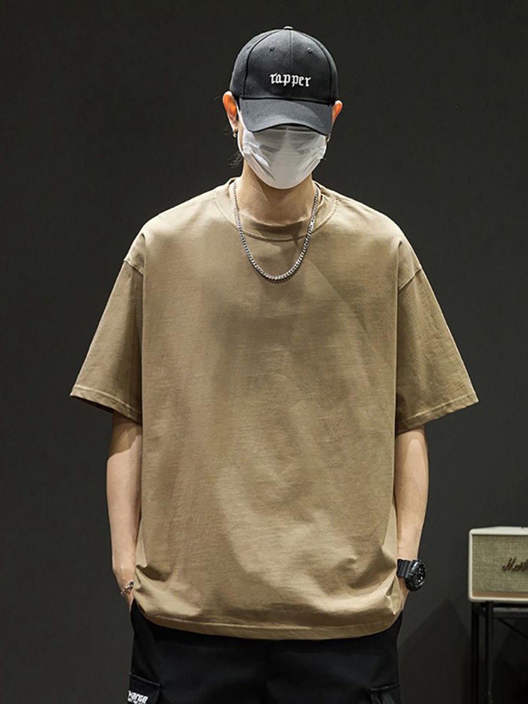 

StyleCast x Revolte Men Solid Round Neck Cotton Oversized T-shirt, Brown