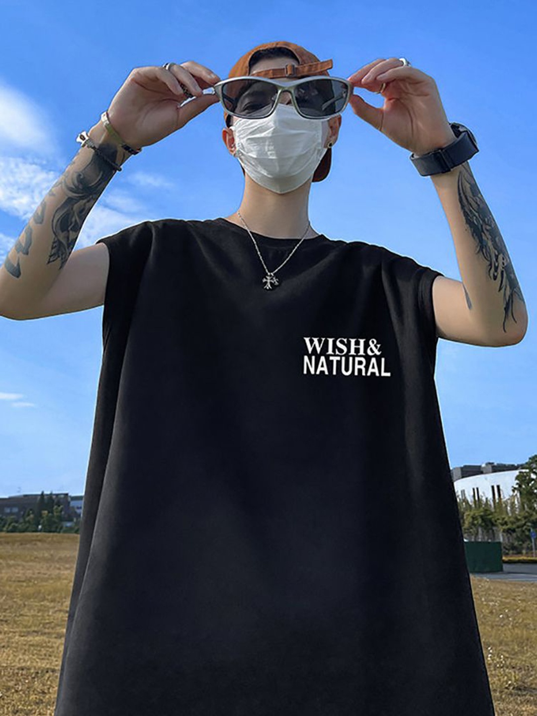 

StyleCast x Revolte Men Typography Printed Round Neck Oversized T-shirt, Black